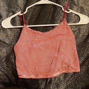 tank top color white n pink size:small use only 3 times still new